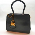 vintage judith leiber pocketwatch handbag