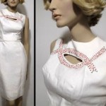 vintage 1950s sleek white dress with cut-out
