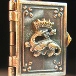 vintage 1910 book charm with fountainebleu pictures inside
