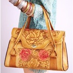 vintage 1970s tooled rose handbag