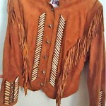 vintage 1970s suede fringe and bone jacket
