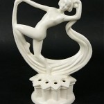 vintage art deco porcelain flower frog figurine