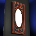 antique gothic mirror with carved bats