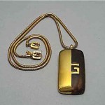 vintage 1977 givenchy lucite logo necklace