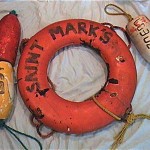 vintage decorative old buoys and life preserver ring