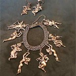 vintage 1950s margot de taxco silver cherubs bracelet and earrings