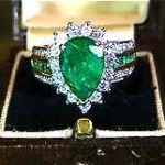 vintage 4.15k diamond and emerald ring