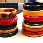 collection of bakelite and lucite bracelets