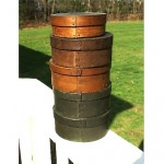 vintage collection of round wooden pantry boxes