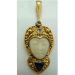 vintage 18k sajen jeweled goddess pendant