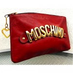 vintage 1970s moschino small leather clutch z