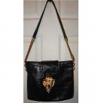 vintage harry rosenfeld leather handbag with wolf closure