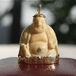 vintage 18k buddha charm with diamond