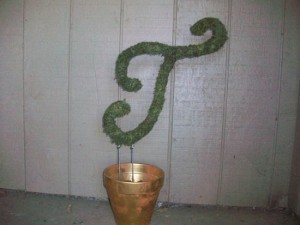 lady welder topiary letter