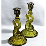 vintage pair of 1920s sterling emerald uranium dolphin candlesticks