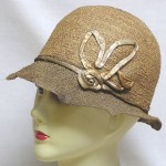 vintage 1920s woven straw hat with satin ribbon decoration