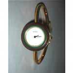 vintage gucci watch with two extra bezels