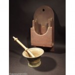 antique primitive mortar and pestle with wall box