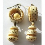 antique pair of carved inlay cow bone earrings