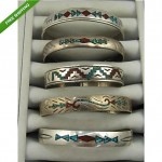 collection of vintage chip inlay sterling cuff bracelets