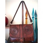 vintage 1960s tooled leather buckle bag