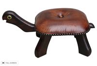 vintage leather upholstered turtle bench