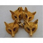 antique fox cufflinks with ruby eyes