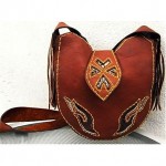 vintage 1970s fringe saddle shoulder bag