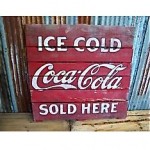 vintage coca cola advertising sign