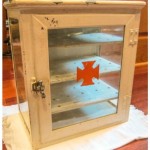 vintage metal and glass medical cabinet