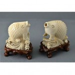 antique pair chinese cow bone fish figures
