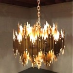 vintage brutalist torch cut chandelier