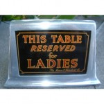 vintage 1925 chrome reverse painted table sign