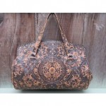 vintage tooled leather handbag