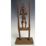 antique 1900s folk art carved acrobat flip toy