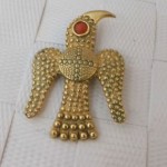 antique coral bird pendant