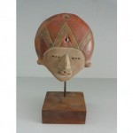 antique pre-columbian pottery mask head with stand