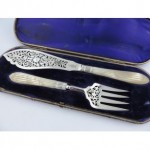 antique 1879 silver and mother of pearl fish servers