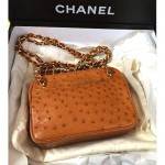 pre-owned chanel ostrich purse