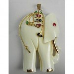 vintage 14k jeweled carved bone elephant pendant