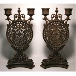 antique 19th century cast iron figural candlesticks