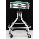 vintage chrome and vinyl stool on wheels