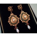 vintage russian mogul emerald pearl serpent earrings