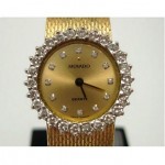 vintage movado 14k gold and diamond watch