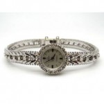 pre-owned omega 18k diamond watch