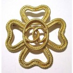 vintage chanel logo brooch