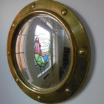 vintage brass porthole mirror