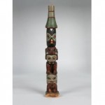 antique native american totem pole sculpture