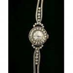 vintage rolex bracelet watch with diamond bezel