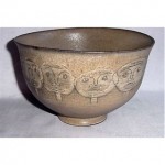 vintage scheier pottery bowl with incised faces